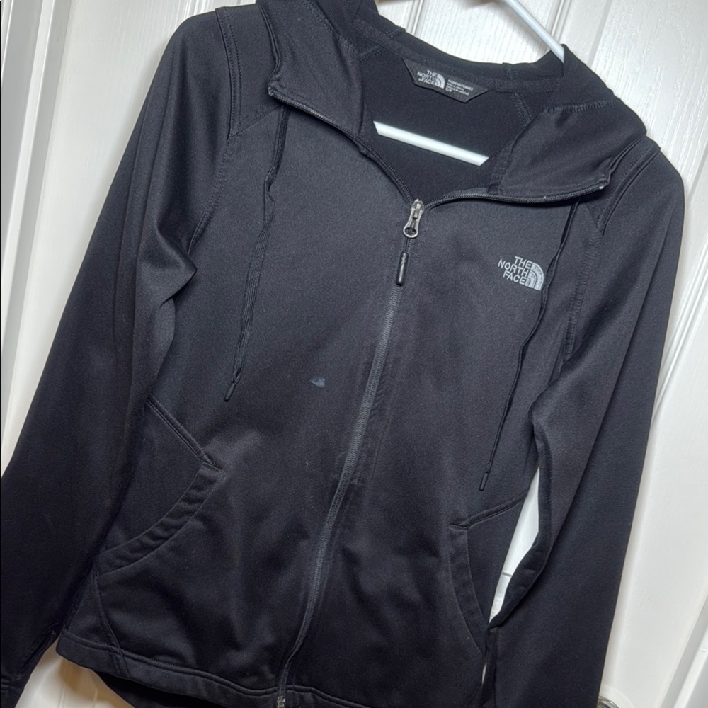 The North Face zip-up jacket. Size XS.